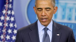 Obama condemns an 'act of terror' and an 'attack on all of us'