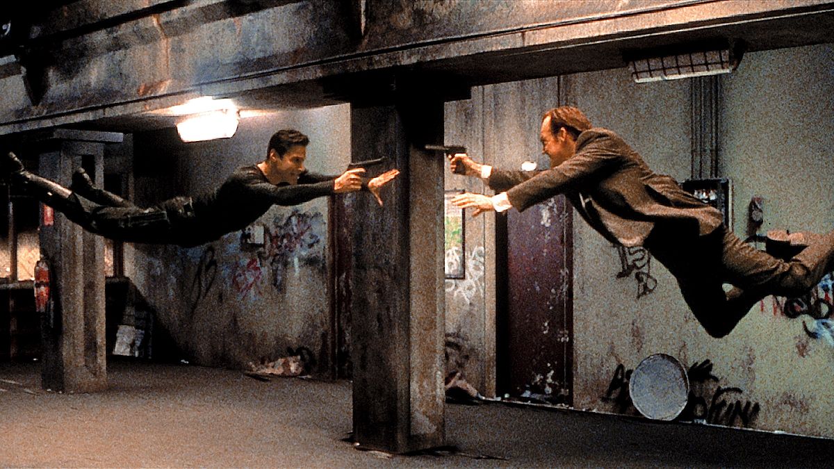 Keanu Reeves and Hugo Weaving in a scene from The Matrix