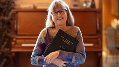 Image: Donna Strickland speaks on the phone after winning the Nobel Prize f