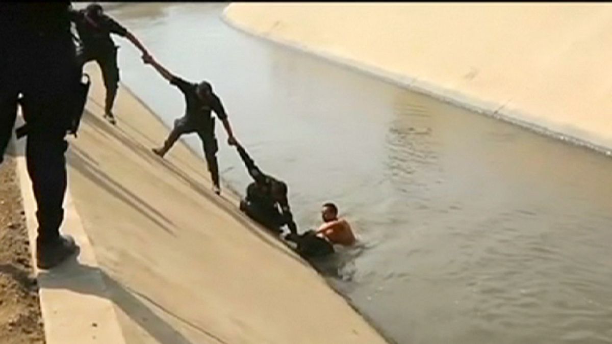Peruvian police rescue dog trapped in canal