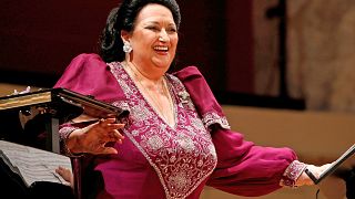 Image: Spanish opera singer Montserrat Caballe laughs during a concert at K