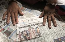 Image: A newspaper clipping featuring an image of Qasim Qureshi's lynching