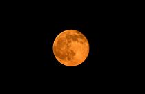 Strawberry moon lights up summer solstice
