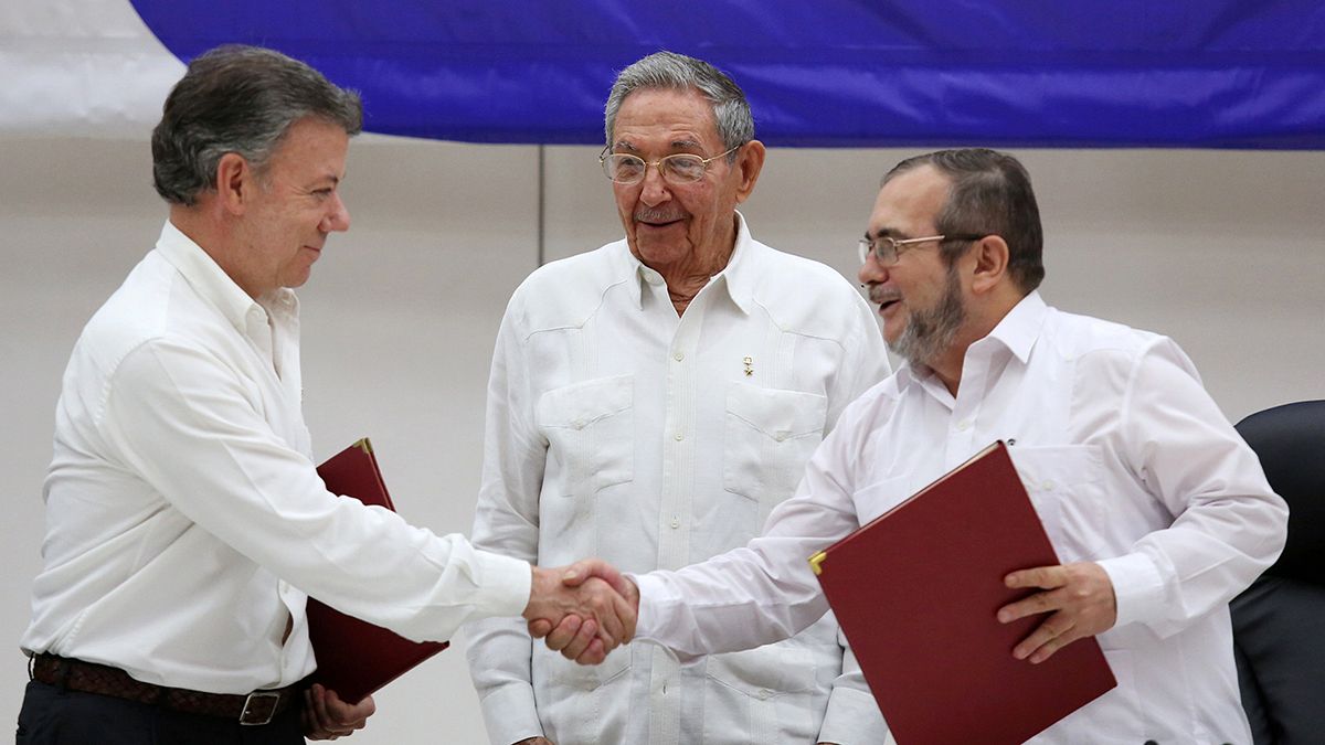 Colombia's government and main rebel army sign historic ceasefire deal in Cuba