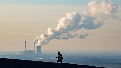 Steam and exhaust rise from the power plant of STEAG on a cold winter day o
