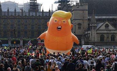 A balloon mocking Donald Trump flies over Parliament Square in London during protests marking the president\'s visit to the country July 13.