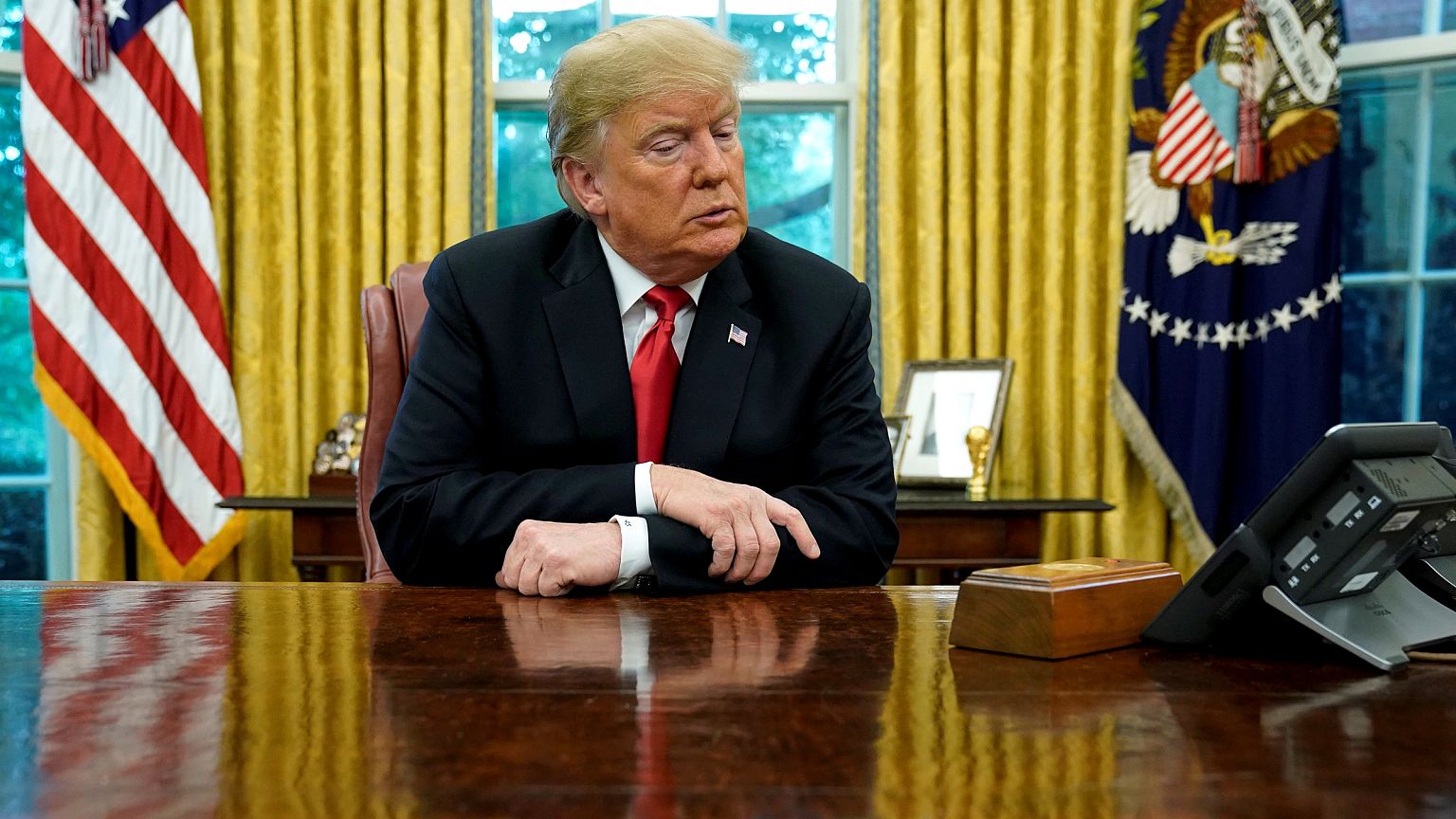 Image: U.S. President Trump speaks to reporters in the Oval Office at the W