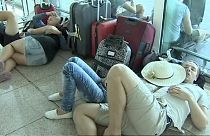 Holidaymakers stranded by delays and cancellations at Barcelona airport