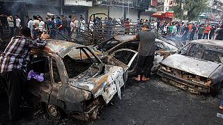 At least 80 killed, scores wounded in twin Baghdad bombings