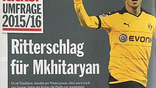 Done deal: Mkhitaryan completes £26 million move to Old Trafford