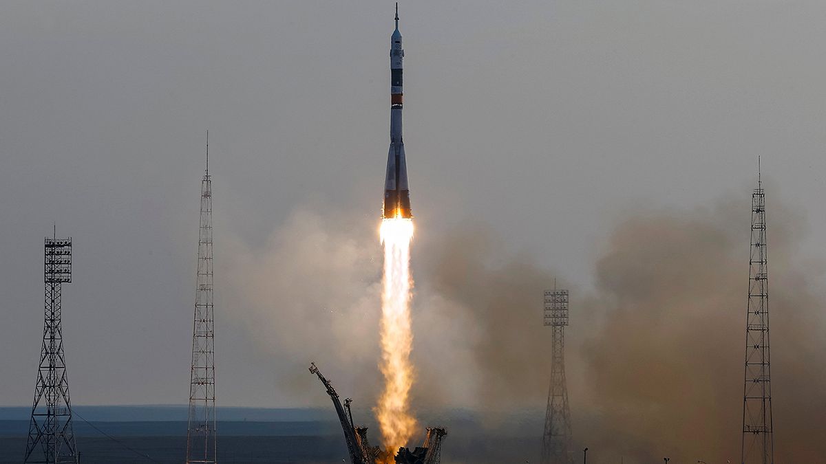 Mutinational three-member crew heads for Space Station in next generation Soyuz capsule