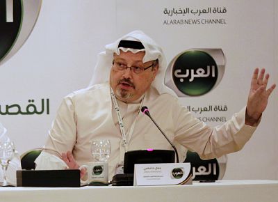 Jamal Khashoggi speaks during a press conference, in Manama, Bahrain on Dec. 15, 2014.