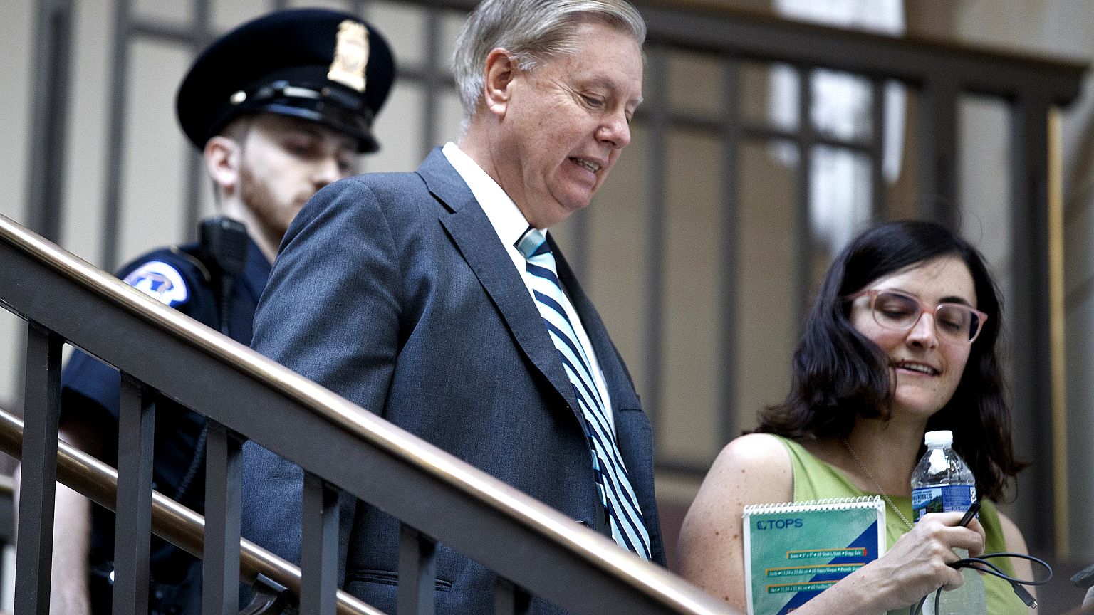 Image: Members of the Senate review the FBI report on Supreme Court nominee