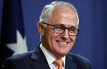 Australian PM declares narrow election victory