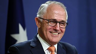 Australian PM declares narrow election victory