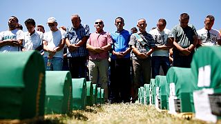 Srebrenica buries 127 newly-found victims on 21st anniversary of massacre