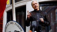 Image:  WikiLeaks founder Julian Assange speaks on the balcony of the Ecuad