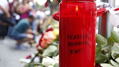 Mourners pay respects at scene of Munich shooting rampage
