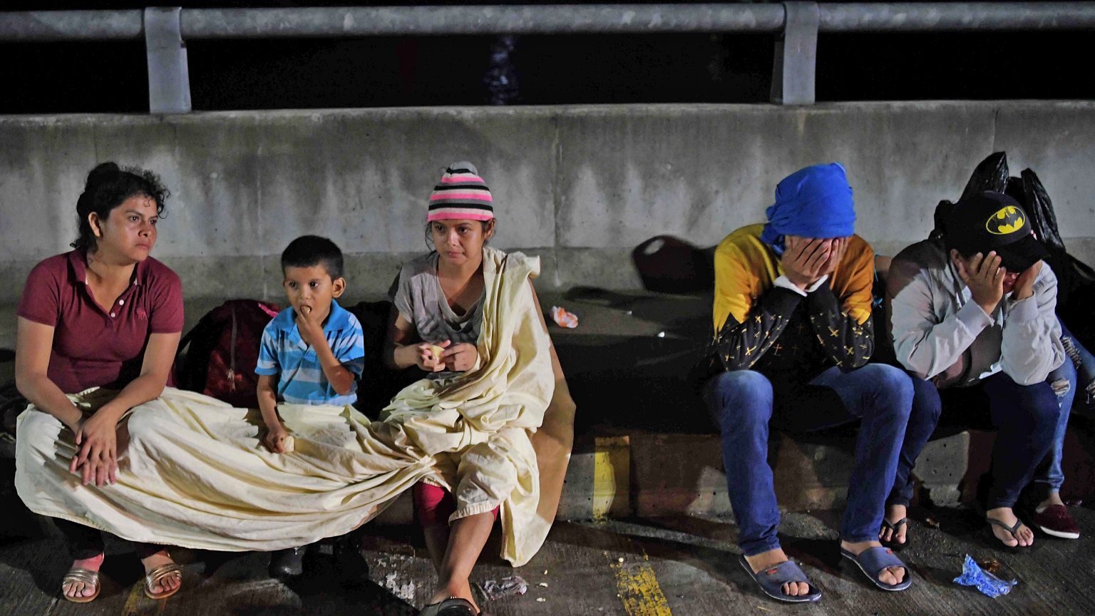 Image: TOPSHOT-EL SALVADOR-HONDURAS-US-MIGRANTS-DIPLOMACY