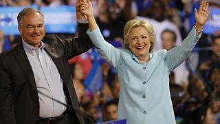 What are the political positions of the Clinton-Kaine ticket?