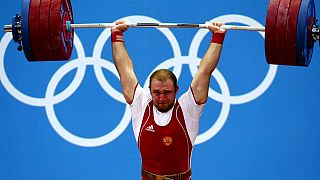 Eleven weightlifters, including six medalists, retest positive from London 2012