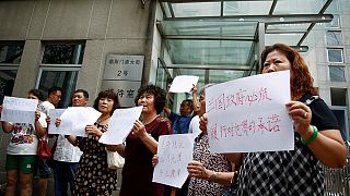 MH370: relatives call for more to be done as authorities say search could be suspended