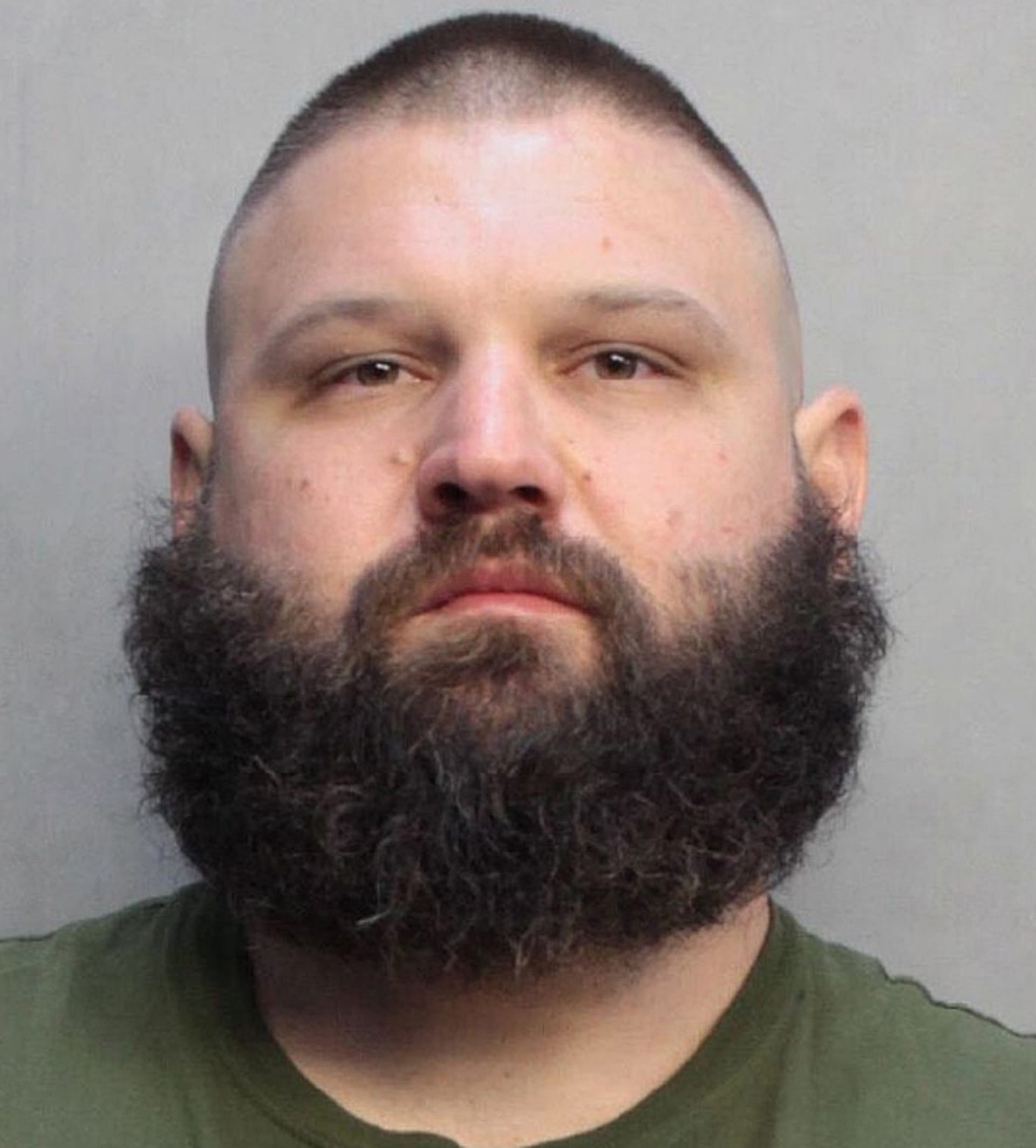 Arsenal of weapons found in truck of man passed out behind wheel in ...