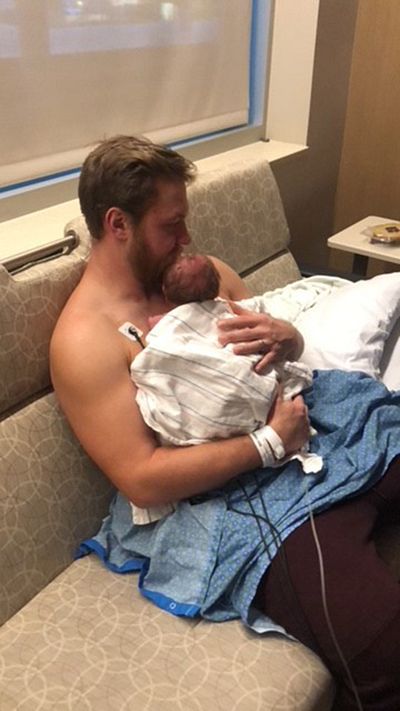 Andrew was able to have some skin-to-skin contact with his newborn son shortly after his birth. 
