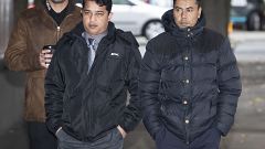 Harun Rashid, left, 38, and Mohammed Kuddus, right, 40, arrive at Mancheste