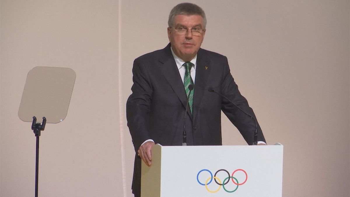 Bach defends IOC decision on Russia at 129th Session