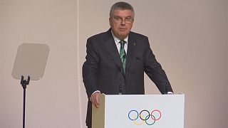 Bach defends IOC decision on Russia at 129th Session