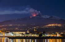Image: Mount Etna spews lava as the Sicilian town of Riposto