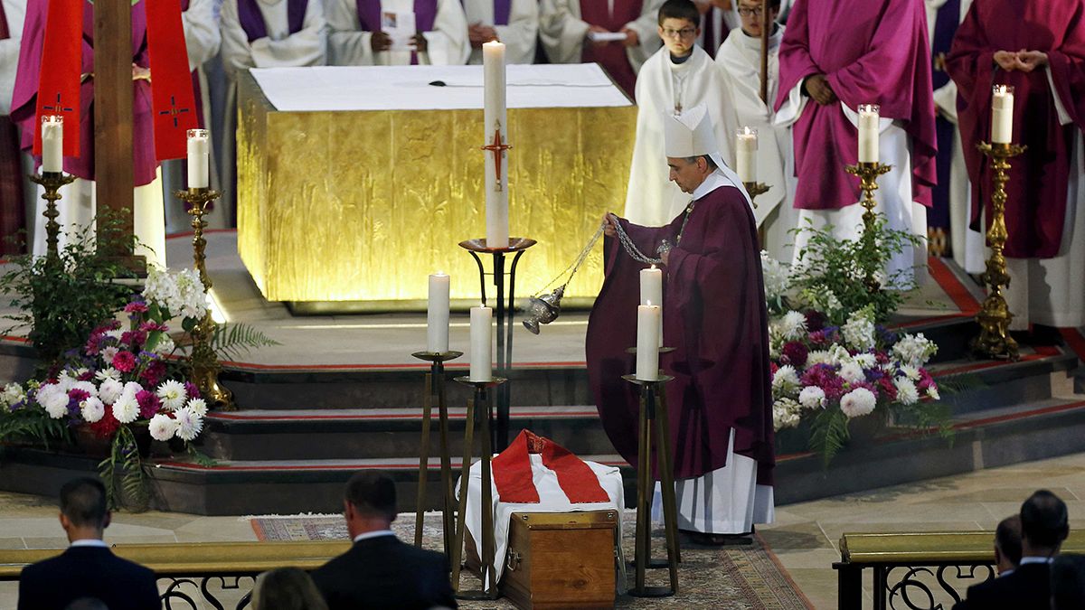 Thousands turn out for funeral of murdered French priest