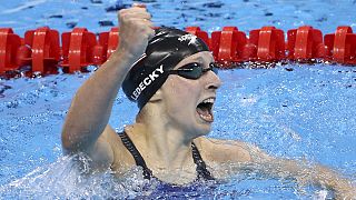 Katie Ledecky wins Gold in 400 freestyle, smashing own record