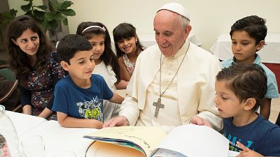 Pope Francis has lunch with 21 Syrian refugees