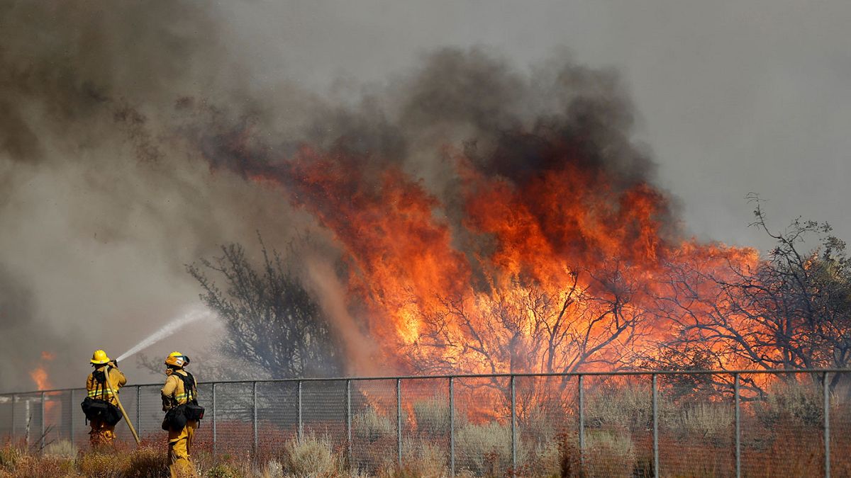 Thousands of homes under threat from southern California wildfires.