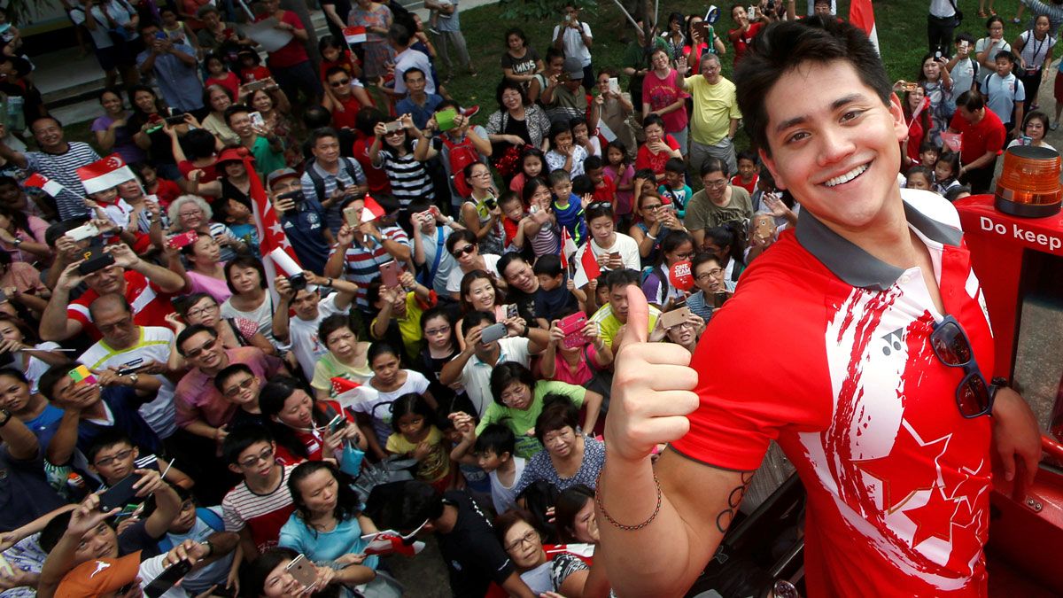 Singapore sling as Schooling returns home to heroes welcome