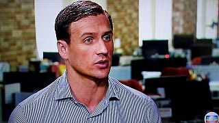 Lochte apologises but insists he did not lie