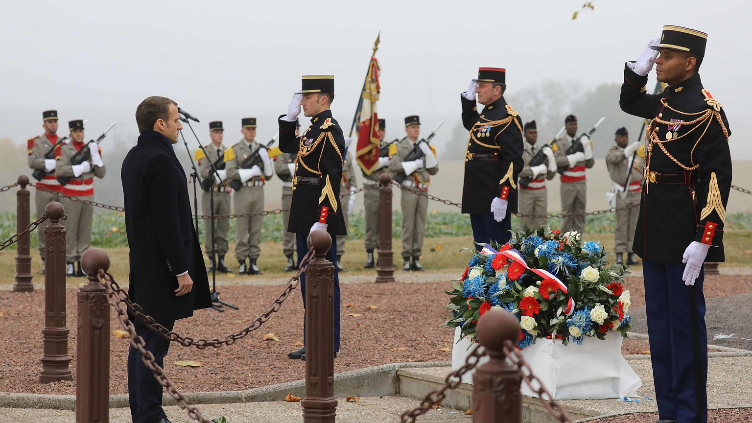Image: French President Emmanuel Macron arrives to attend a ceremony in tri