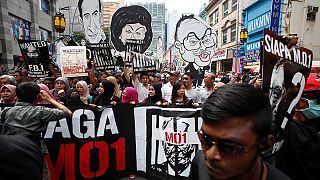Malaysian protesters call for PM's arrest