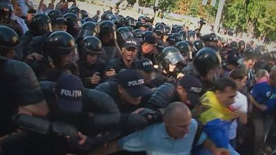 Protesters clash with police at Moldova independence day parade