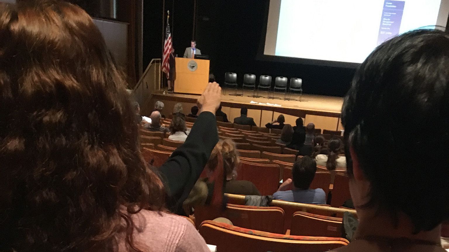 Charles Meyrick, a professor at Housatonic Community College, raises his ha