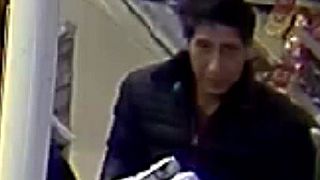 A suspect is seen in surveillance footage posted by Blackpool Police.