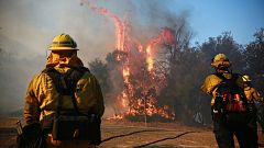 Image: Firefighters battle a blaze at the Salvation Army Camp