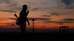Image: The silhouette of an Israeli soldier is pictured in the southern Isr