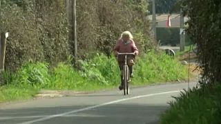 The egg seller and her bike who have a combined age of 140