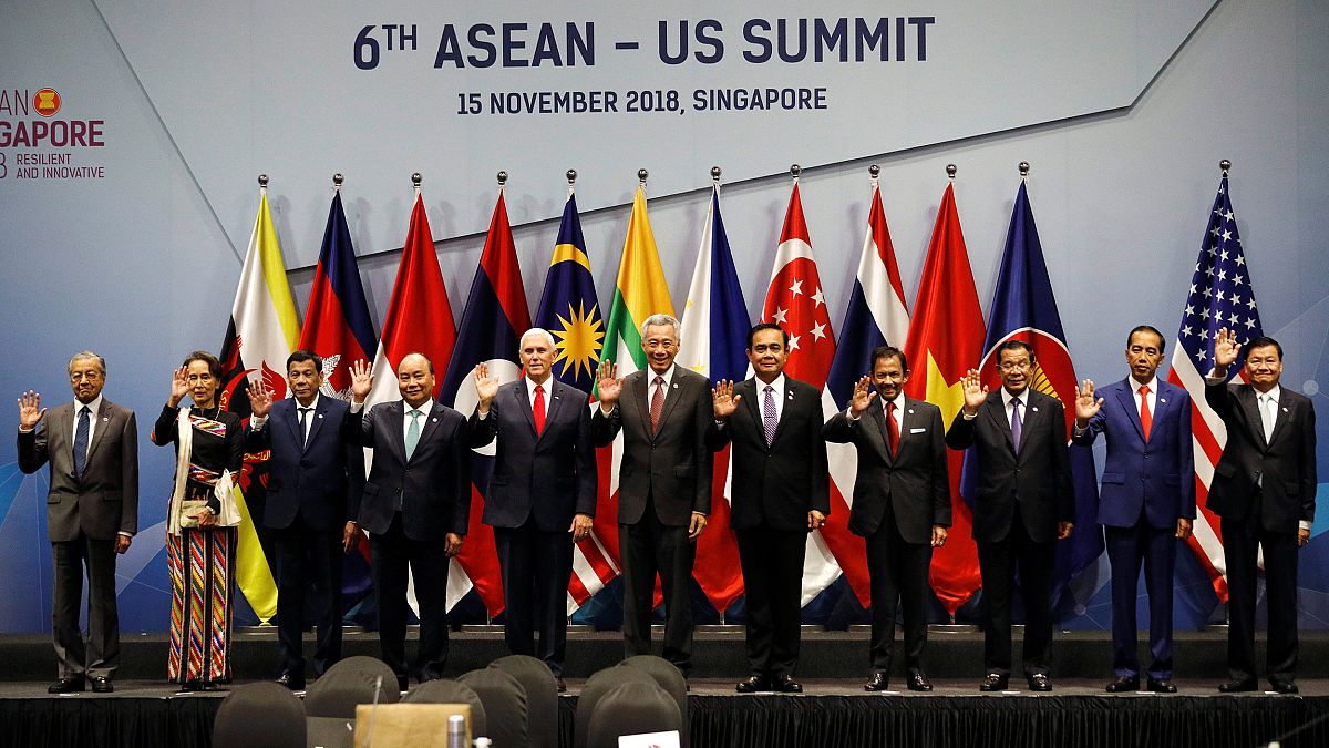 Image: Vice President Mike Pence poses for a photo with ASEAN leaders in Si