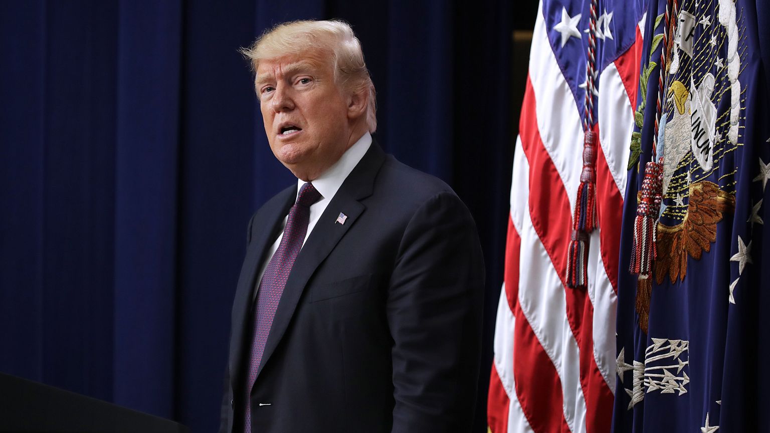 President Donald Trump delivers remarks during a conference in the Eisenhow