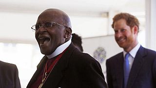 Desmond Tutu returns home after three weeks at a hospital