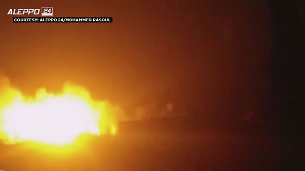 Syrian aid convoy hit by air strikes near Aleppo Syrian aid convoy hit by air strikes near Aleppo